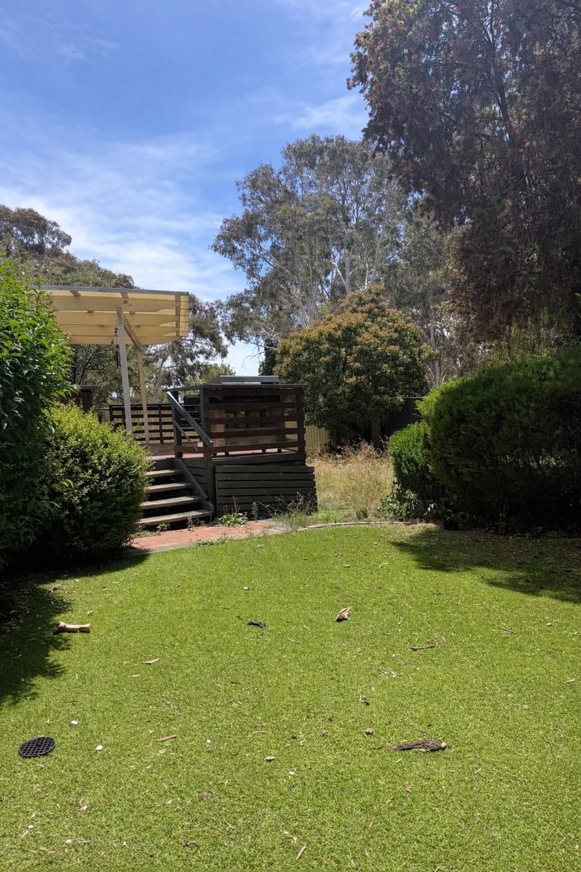 GD Stoneworks landscaping project — outdoor deck and garden area